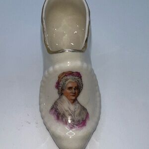 Vintage miniature porcelain shoe features a portrait of Martha Washington
